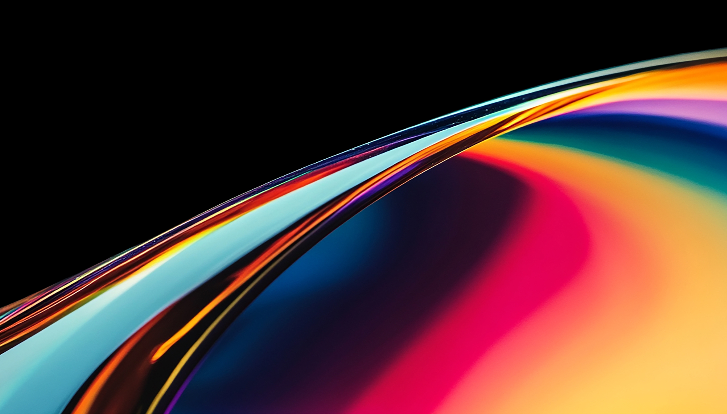 Abstract digital art with vibrant blue, magenta, pink and orange gradients flowing along a luminous curve.